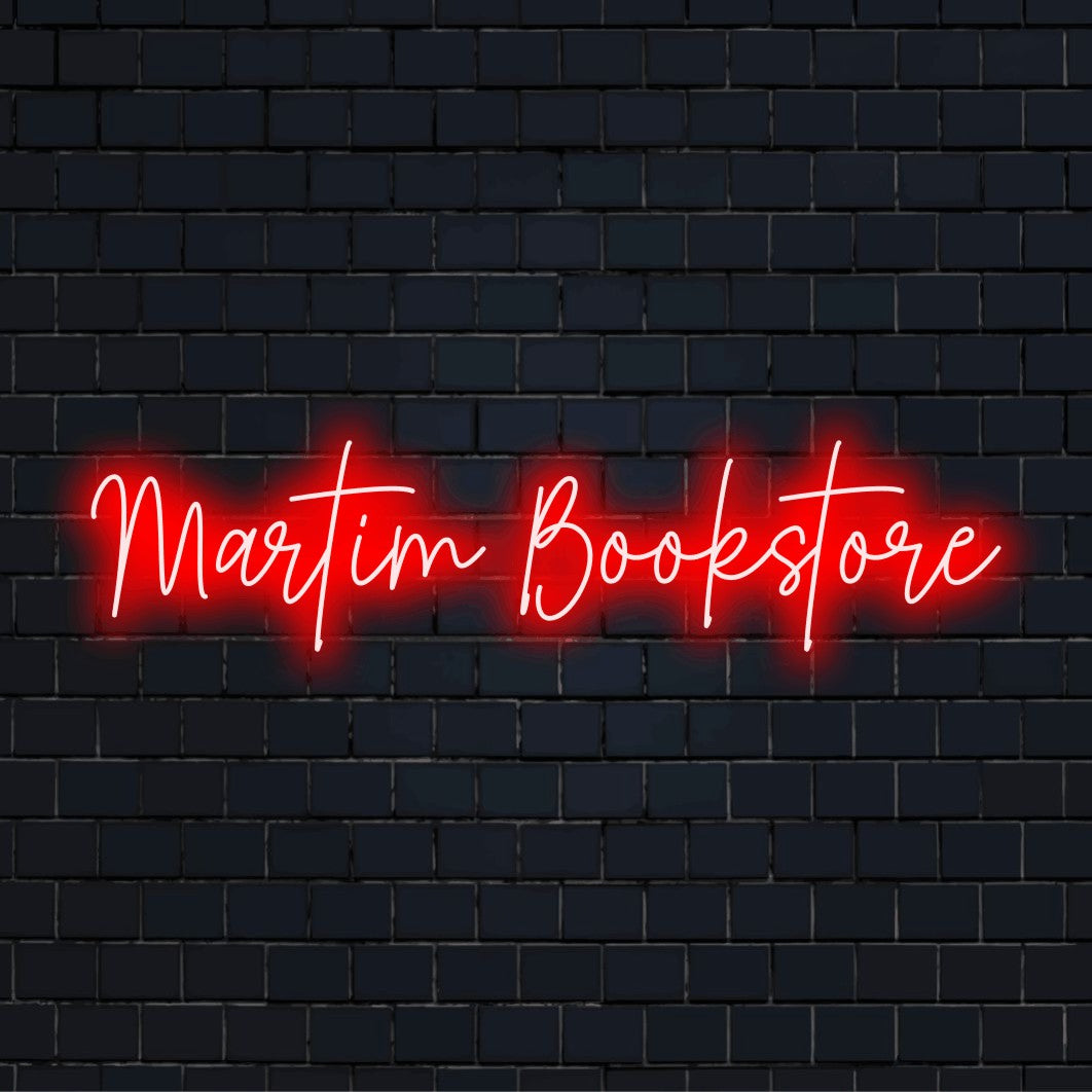 Martim Bookstore Personalized Neon Light with neon text light against black brick wall