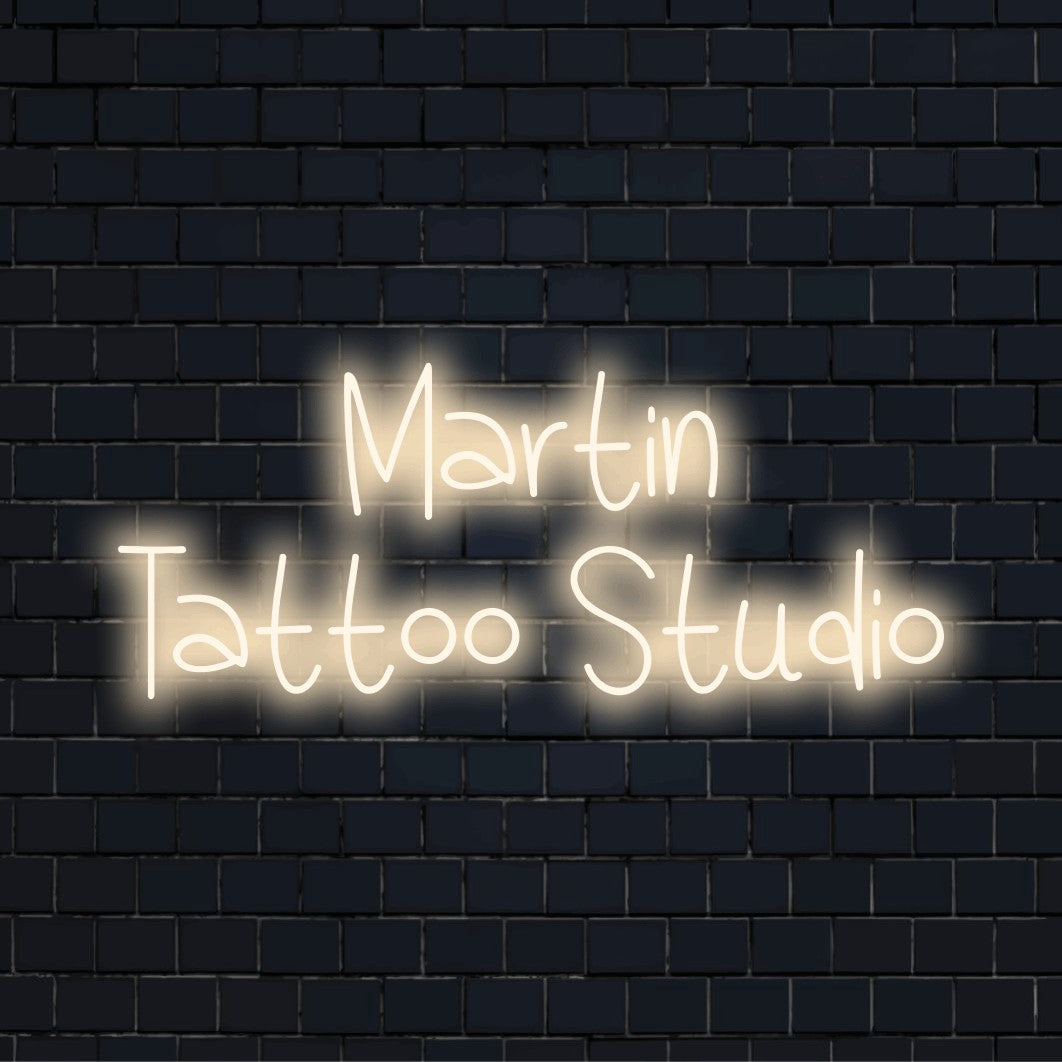 Martin Tattoo Studio Personalized LED Neon Sign, bright neon glow on black brick background