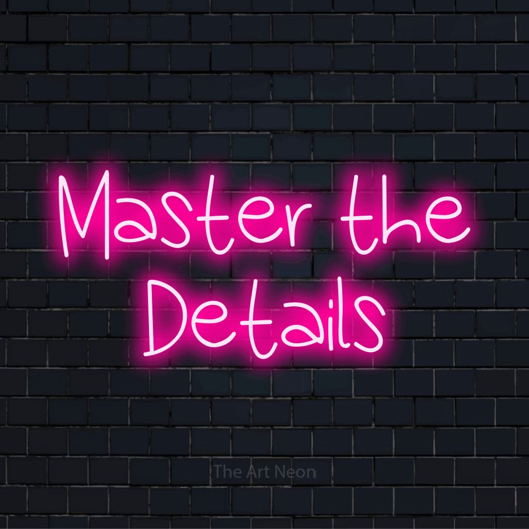 "Master The Details" text design with neon effect on a black brick wall
