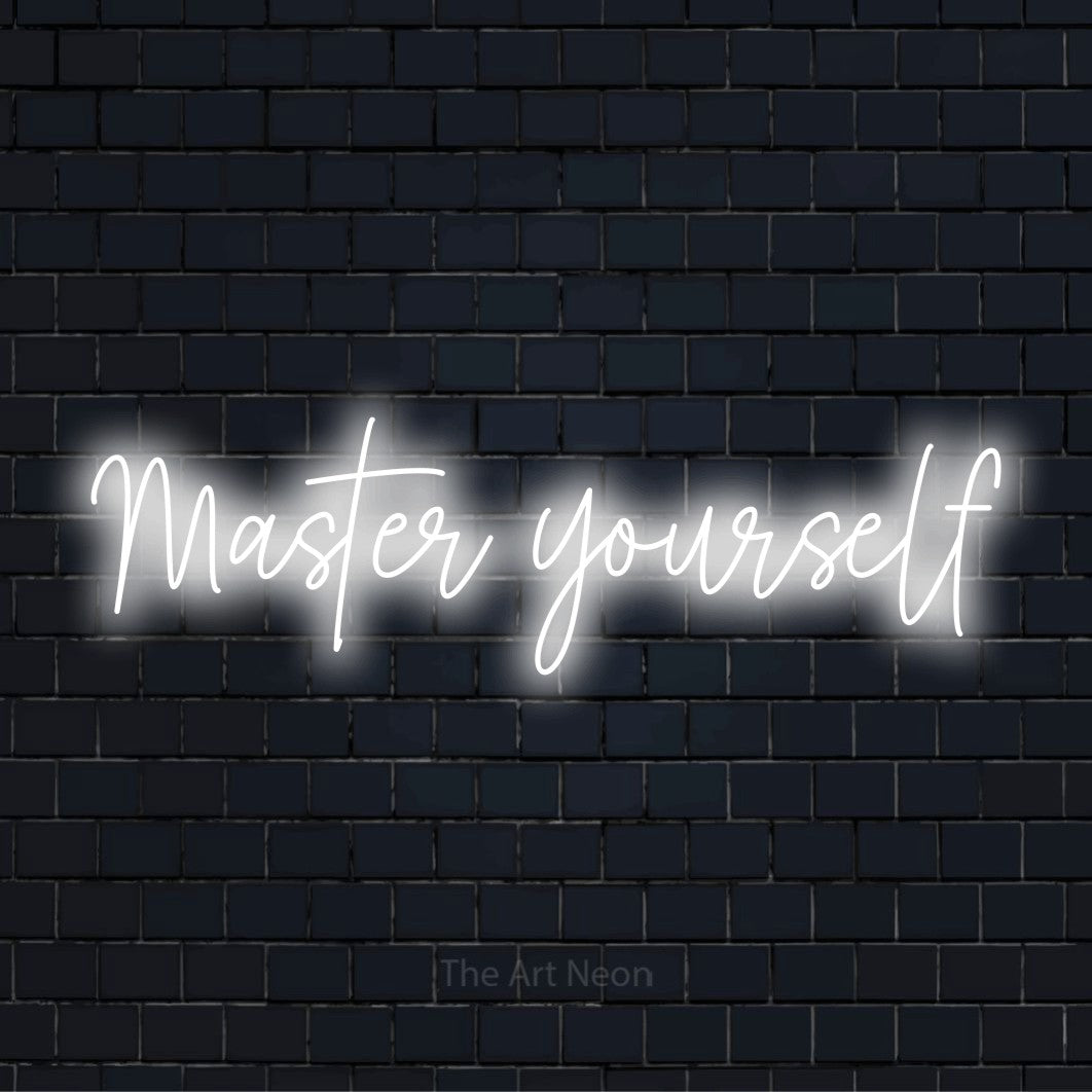 "Master Yourself" glowing LED neon sign on a black brick wall