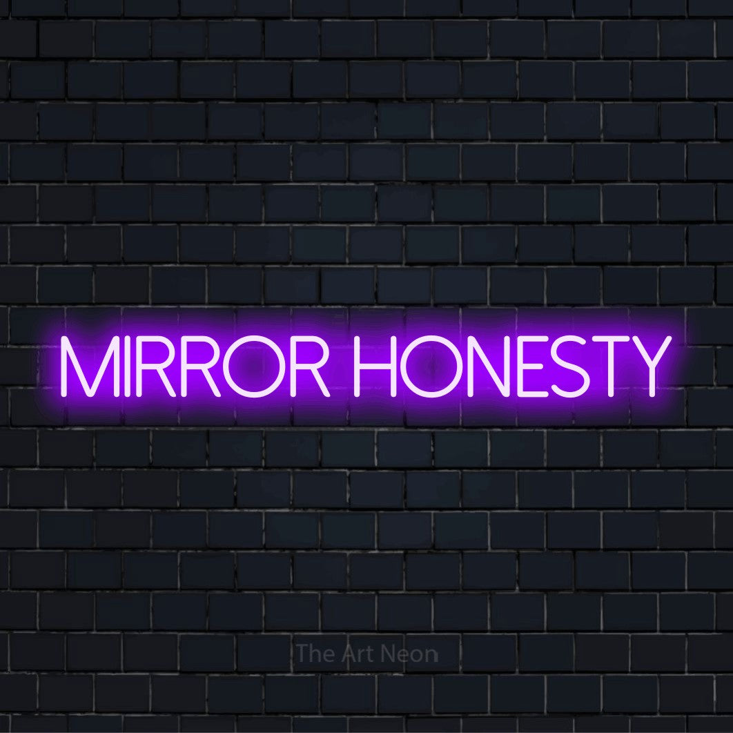 "Mirror Honesty" LED neon sign on a black brick wall