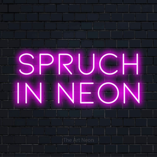 LED-Neonschild mit dem Text „Spruch in Neon“ auf dunkler Ziegelwand