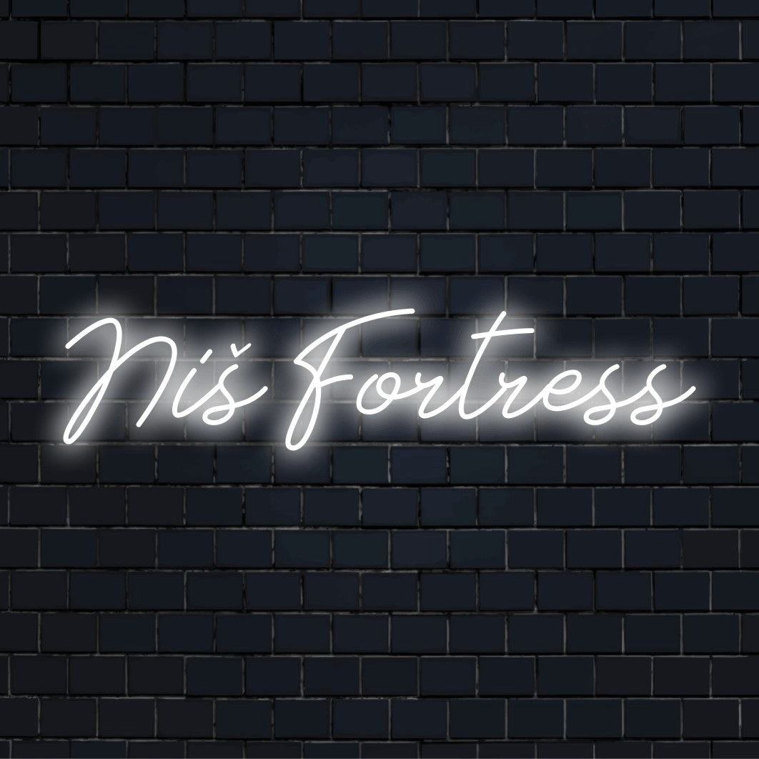 Ni Fortress Neon Light with neon text light against brick backdrop