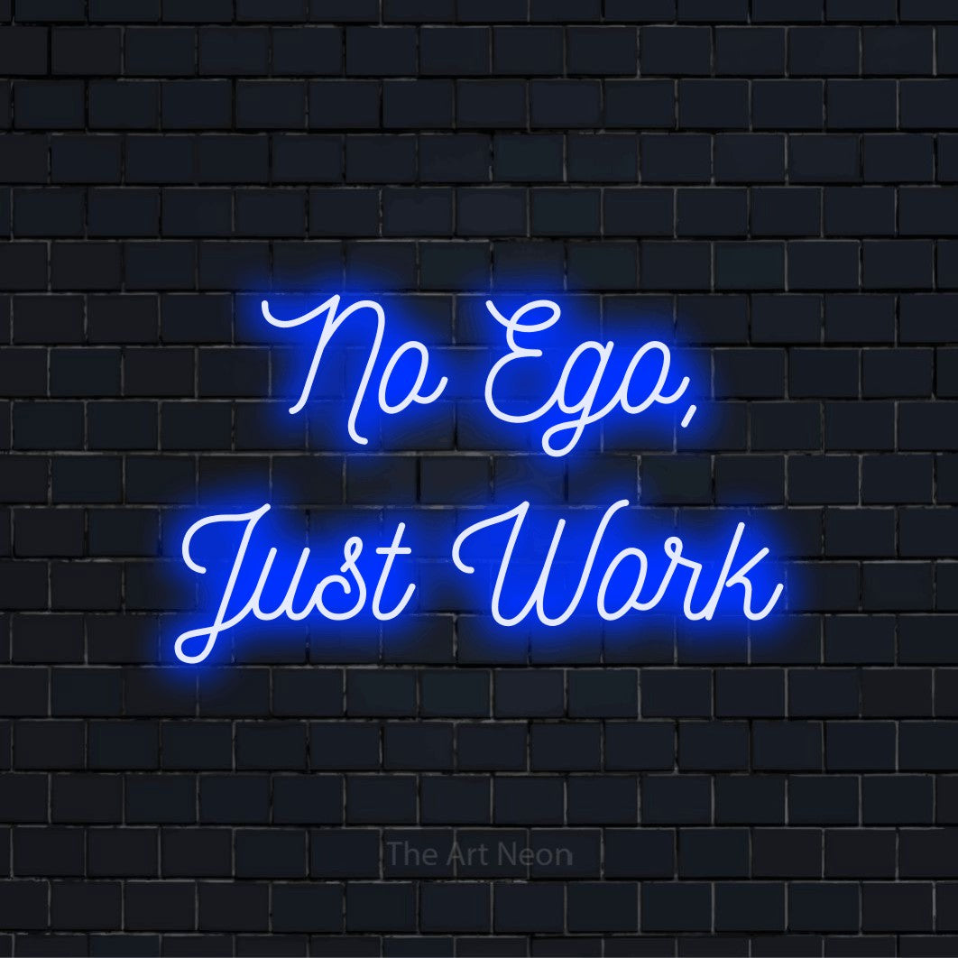 "No Ego, Just Work" glowing LED neon sign on a black brick wall