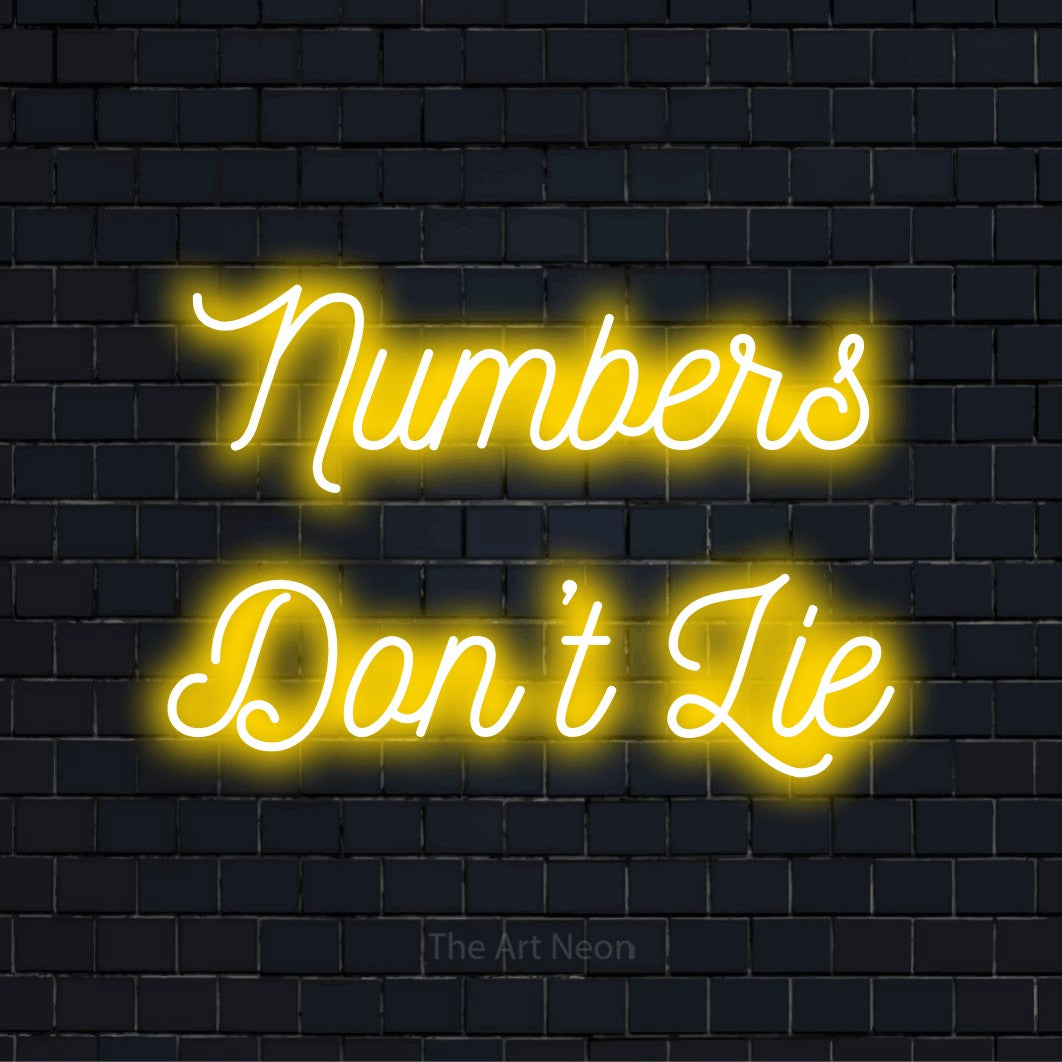 "Numbers Don’t Lie" glowing LED neon sign on a black brick wall