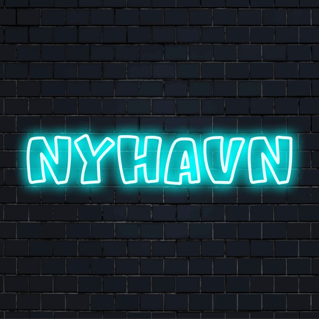 Nyhavn Neon Sign, glowing neon text against black brick wall