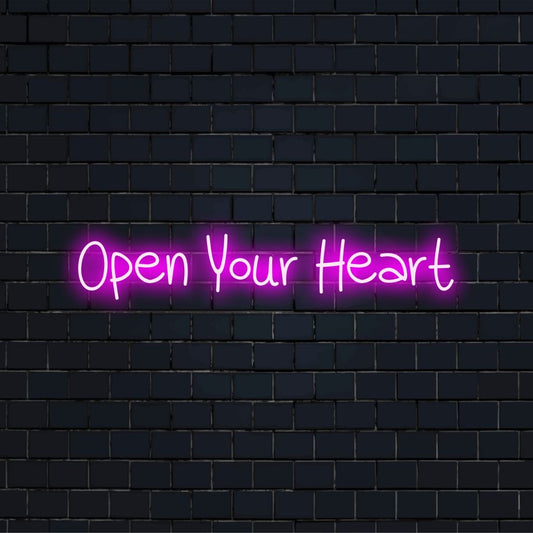 Open Your Heart Neon Sign, glowing lettering against brick backdrop