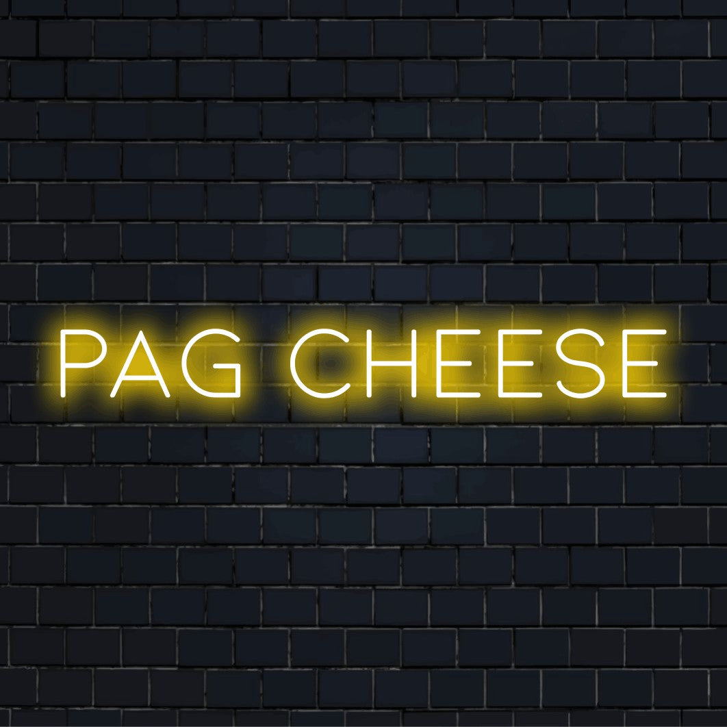 Pag Cheese LED Neon Sign, neon text light on dark brick wall