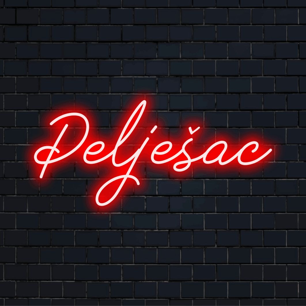 Pelje Ac Neon Sign, bright neon glow on dark brick wall