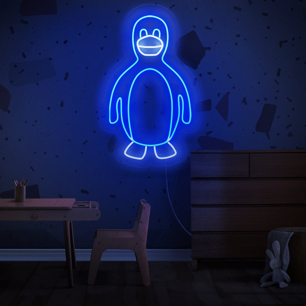 The penguin neon sign is a playful addition to arctic-themed decor, casting a charming and energetic light