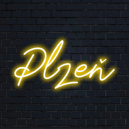 Plze Neon Light with bright neon lettering against black brick wall