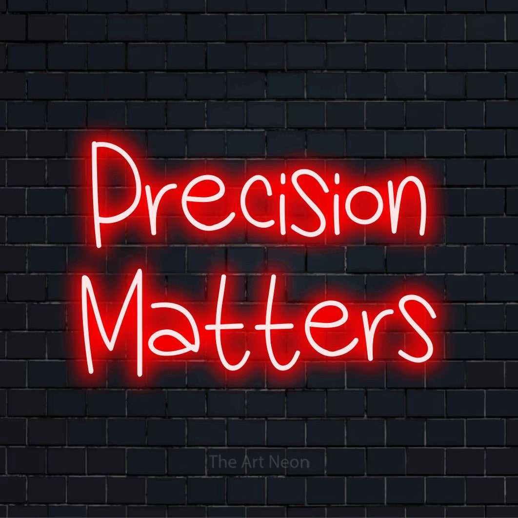 "Precision Matters" text design with neon effect on a black brick wall