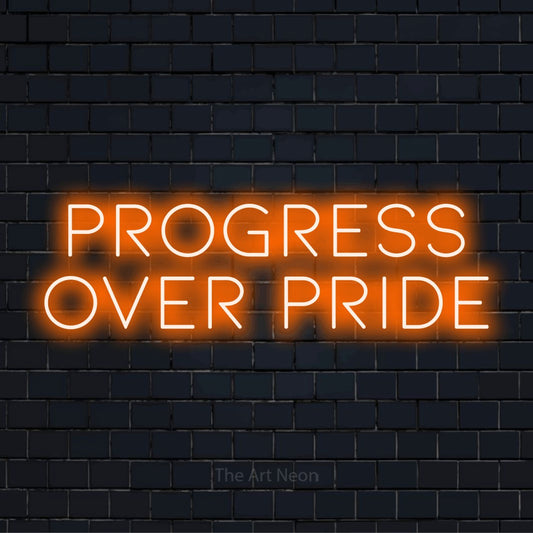 "Progress Over Pride" text design with neon effect on a black brick wall
