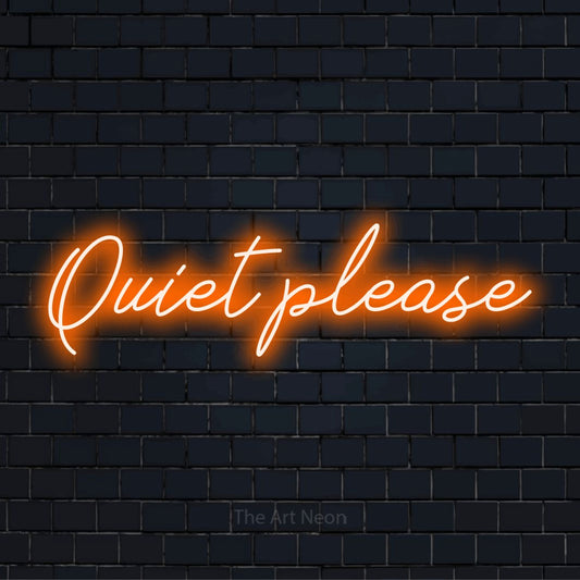 "Quiet Please" text design with neon effect on a black brick wall