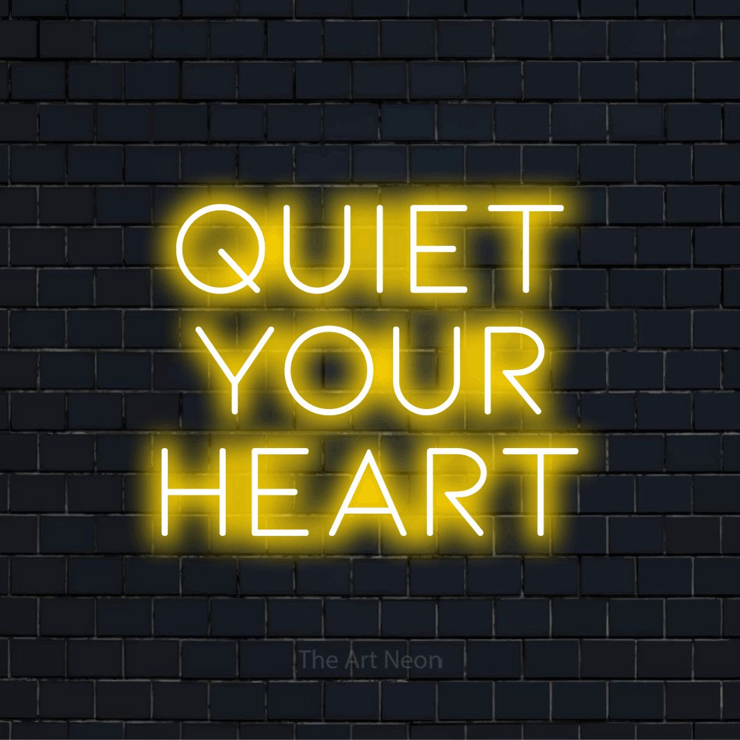 "Quiet Your Heart" glowing LED neon sign on a black brick wall