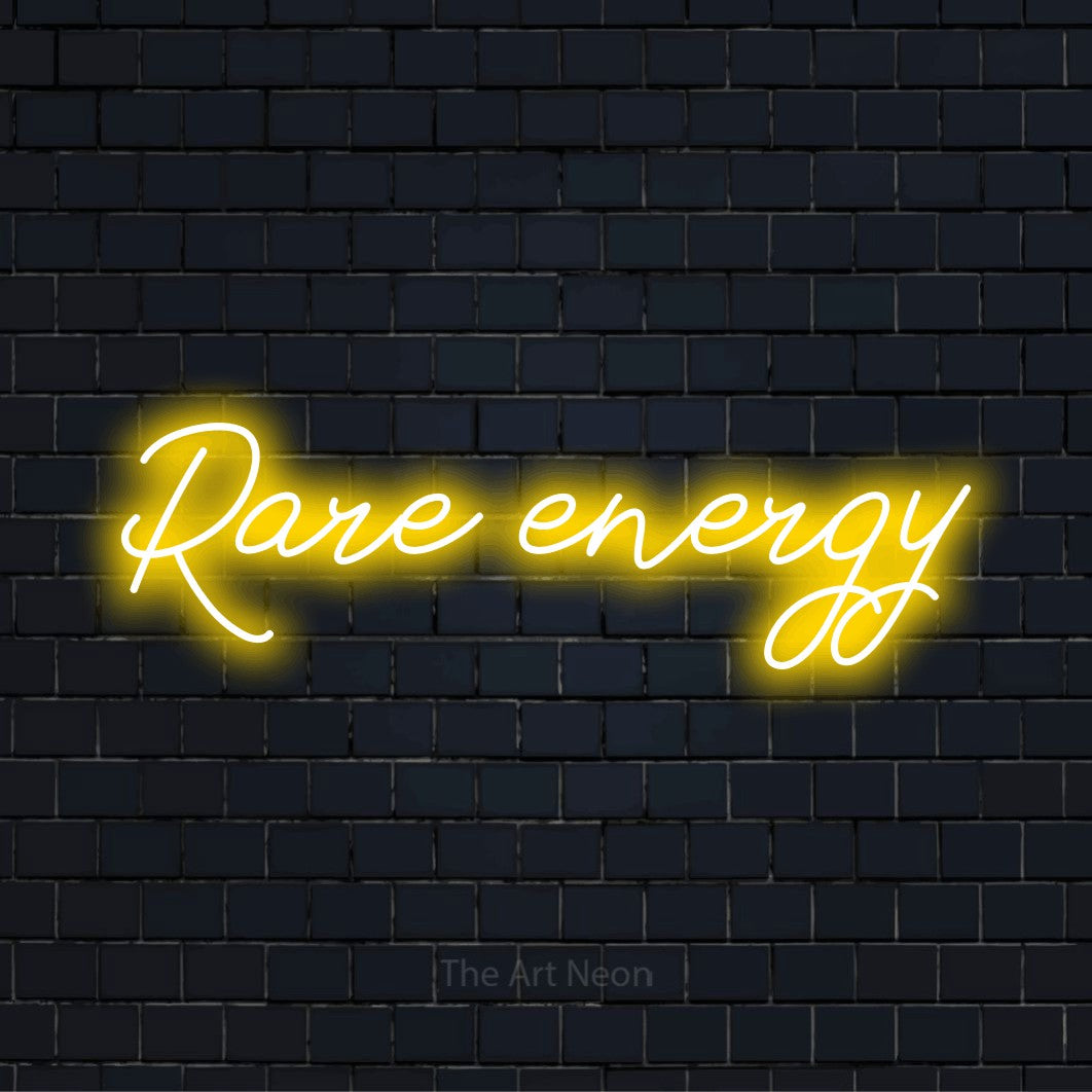 "Rare Energy" neon text design on a black brick wall