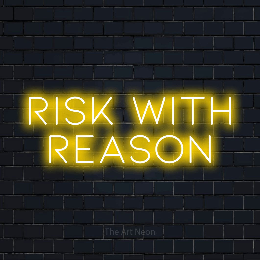 "Risk With Reason" LED neon sign on a black brick wall