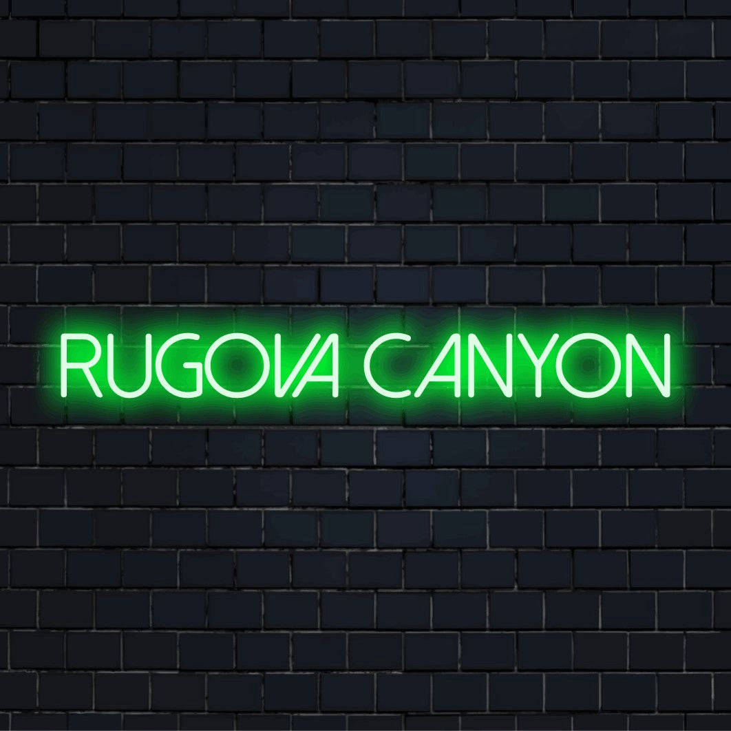 Rugova Canyon LED Neon Sign, bright neon glow on dark brick background