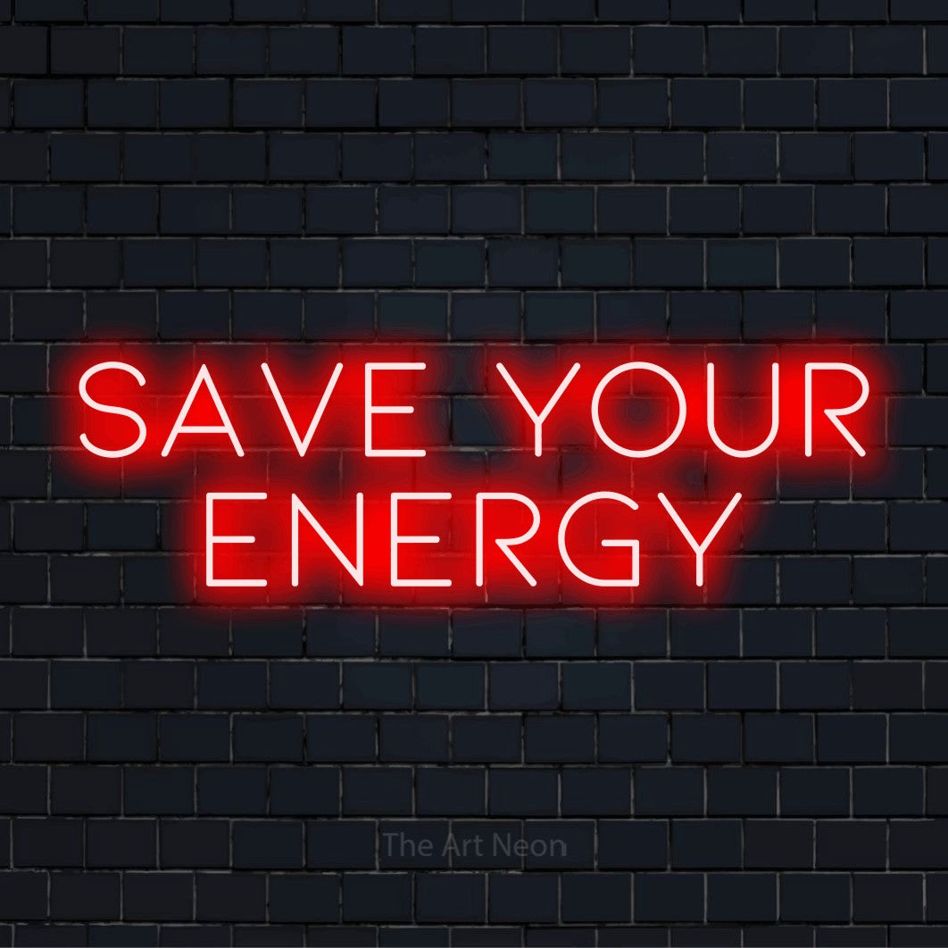 "Save Your Energy" LED neon sign on a black brick wall