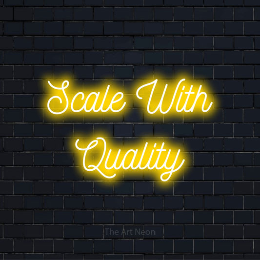 "Scale With Quality" LED neon sign on a black brick wall