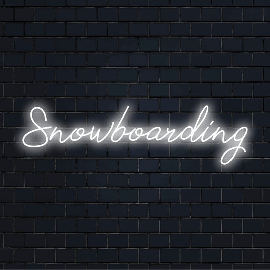 Snowboarding Neon Light with bright LED glow on dark brick background
