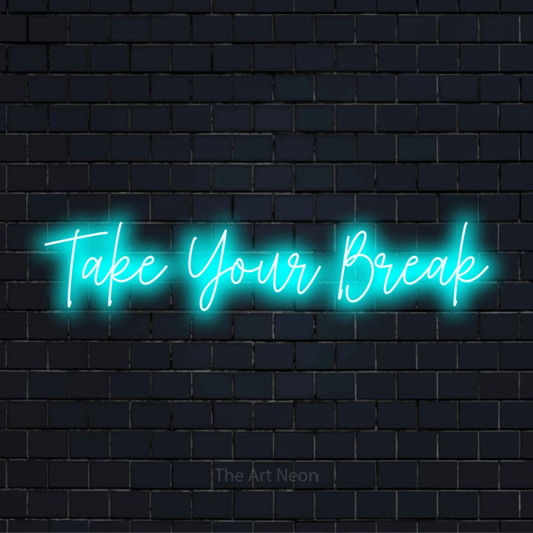 "Take Your Break" neon text design on a black brick wall