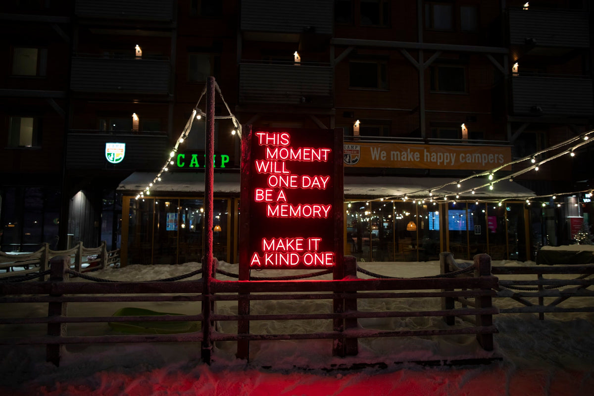 Outdoor LED neon text installation at Ruka Polar Night Light Festival in Finland