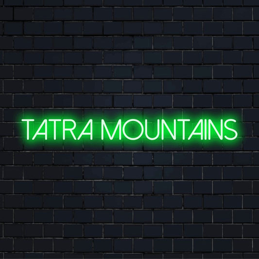 Tatra Mountains Neon Sign, glowing neon text on dark brick wall