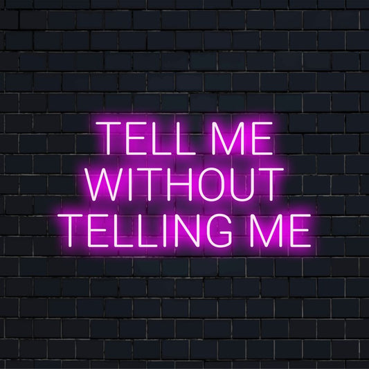 Tell Me Without Telling Me Neon Sign, bright neon glow against brick backdrop