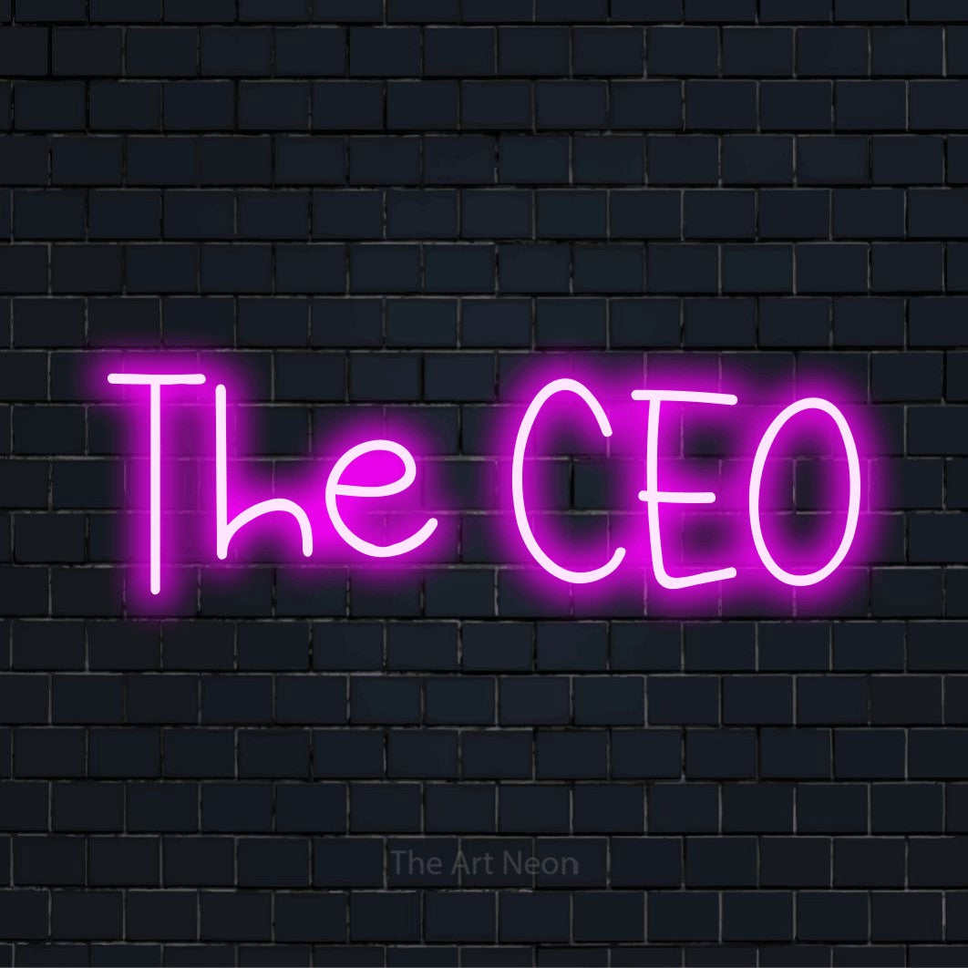 "The Ceo" script-style LED neon sign on a black brick wall