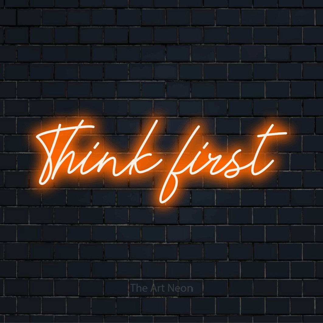 "Think First" neon text design on a black brick wall