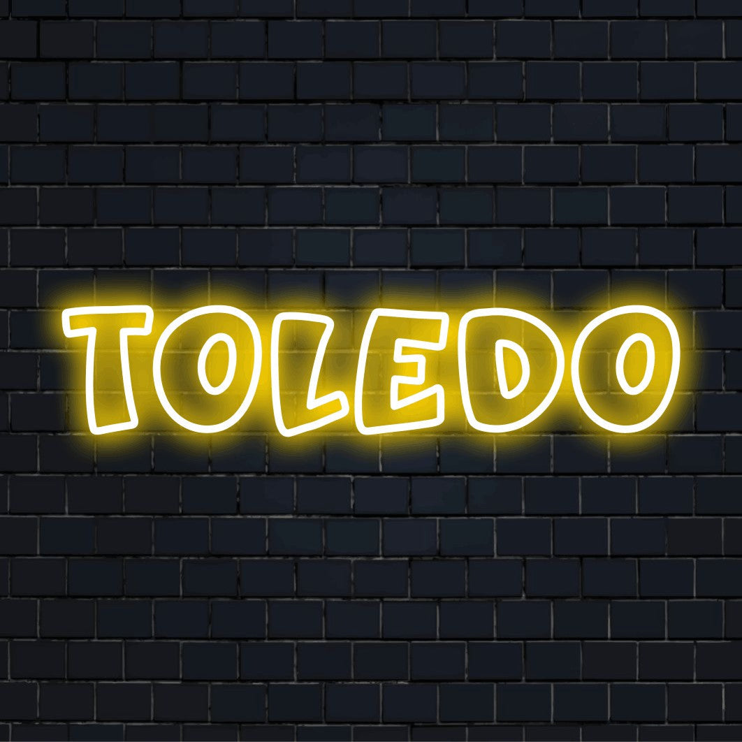 Toledo Neon Sign, glowing wall decor on black brick background