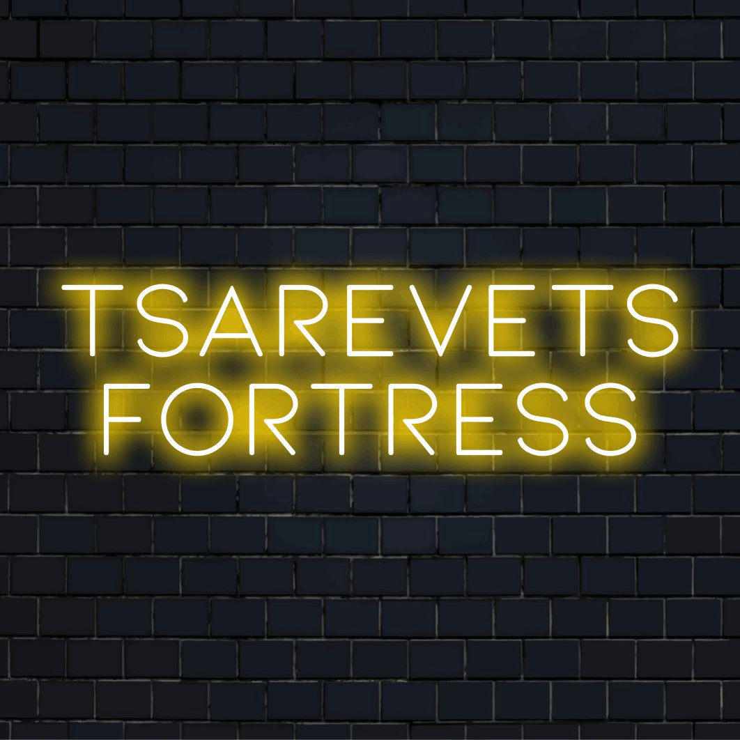Tsarevets Fortress Neon Sign, bright neon glow against brick backdrop