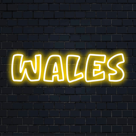 Wales Neon Sign, bright neon glow on black brick background
