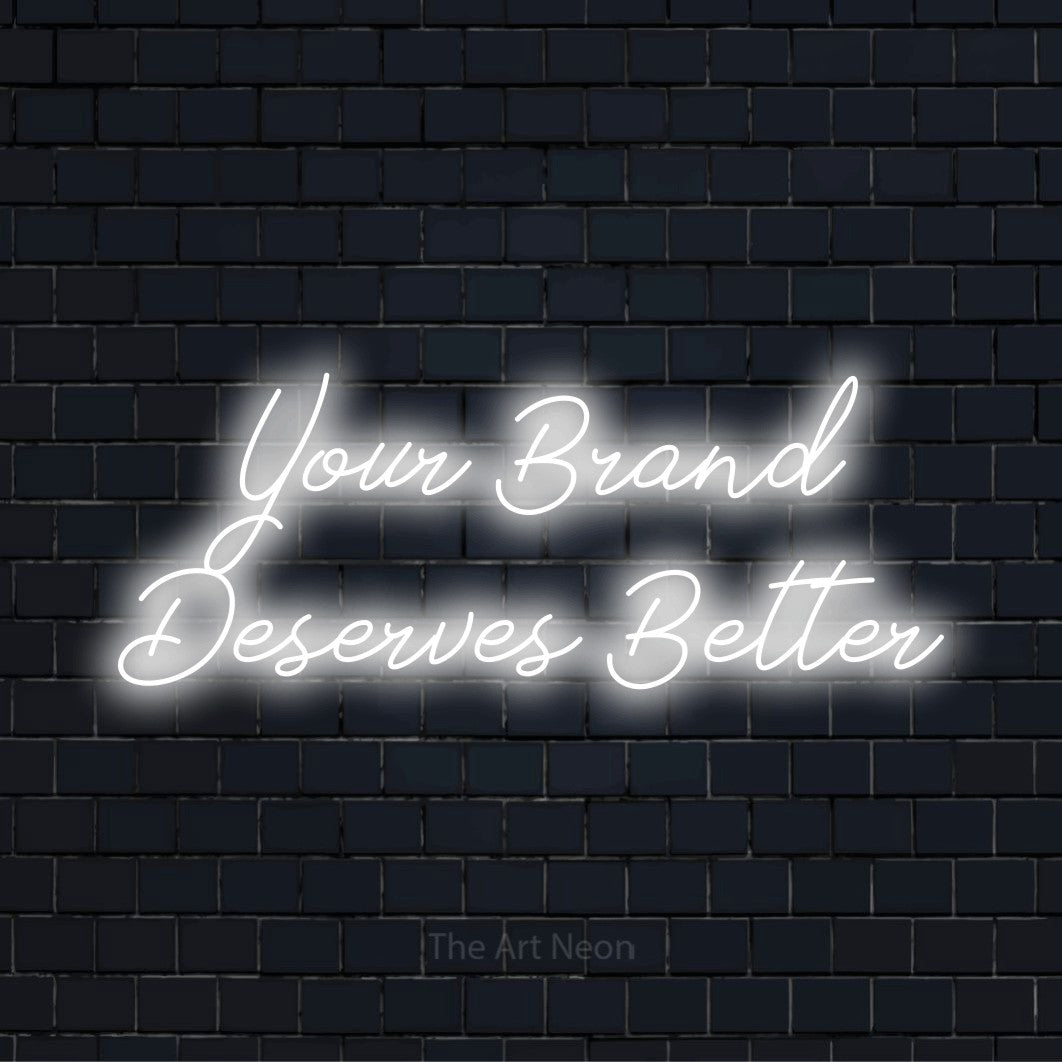 "Your Brand Deserves Better" text design with neon effect on a black brick wall